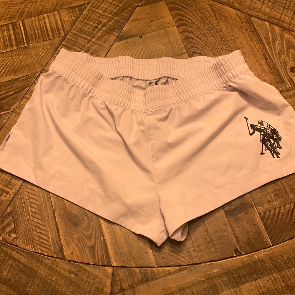 Goes over bathing suit bottoms or activewear. white shorts